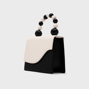 ARIA BEADED LUNCH BAG HUESO NEGRO