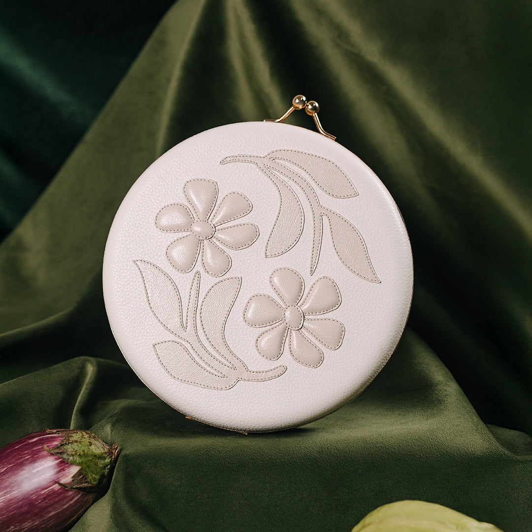 CAMELLIA IVORY CLUTCH