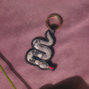 CHARM ANACONDA NEGRO