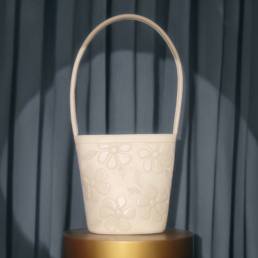 JANIA BONE BUCKET BAG