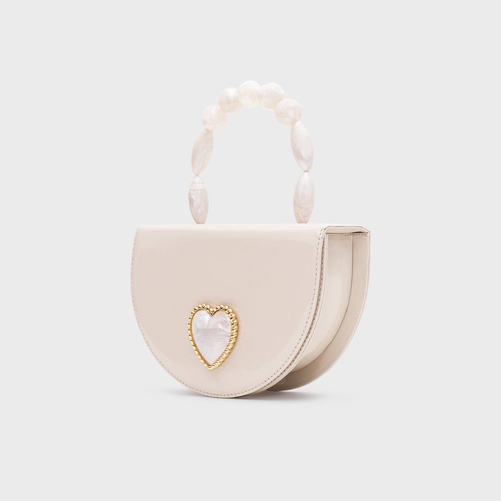 POP HEARTS CIRCLES BAG HUESO